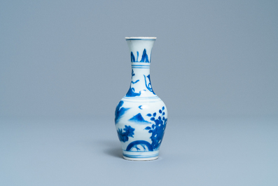 A Chinese blue and white bottle vase with figures in a landscape, Transitional period