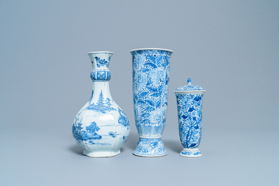 Two Chinese blue and white beaker vases and a bottle vase, Kangxi/Qianlong