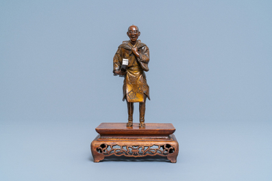 A Japanese bronze Miyao-style okimono, Meiji, 19th C.