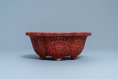 A Chinese carved cinnabar lacquer jardini&egrave;re, Yongzheng/Qianlong