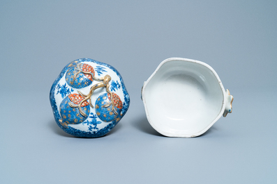 A Chinese blue, white and iron red pomegranate tureen and cover, Jiaqing