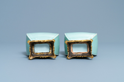 A pair of Chinese monochrome celadon vases with gilt bronze mounts, 18/19th C.