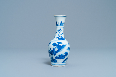 A Chinese blue and white bottle vase with figures in a landscape, Transitional period