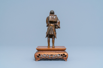 A Japanese bronze Miyao-style okimono, Meiji, 19th C.