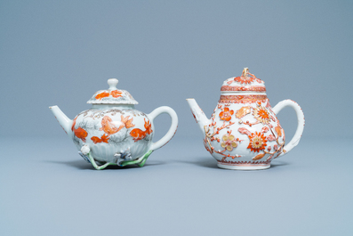 Two Chinese iron red and gilt relief-decorated teapots and one stand, Kangxi/Yongzheng
