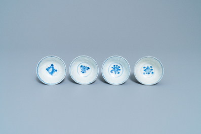 Four Chinese blue and white cups and saucers and three large cups, Kangxi/Qianlong