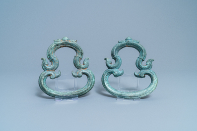 A pair of Chinese bronze ornaments, Han or later