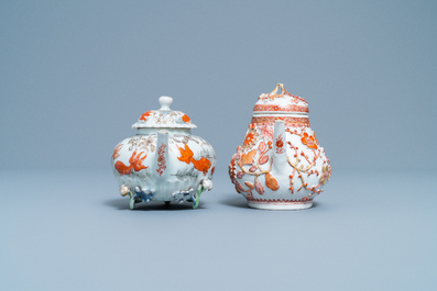 Two Chinese iron red and gilt relief-decorated teapots and one stand, Kangxi/Yongzheng