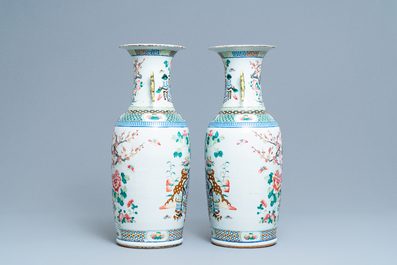 A pair of Chinese famille rose vases, 19th C.