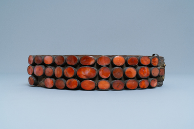 A leather marriage belt with carnelian and brass plaques, Balkan region, 18/19th C.