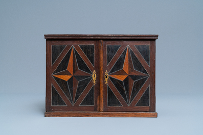 A Dutch wood marquetry and bone inlay table cabinet, 17th C.