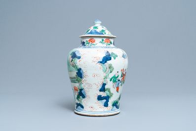 A Chinese wucai 'playing boys' vase and cover, Transitional period