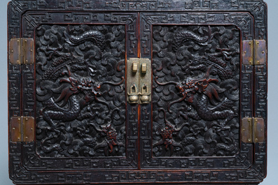 A small Chinese carved wooden 'dragon' cabinet, Republic
