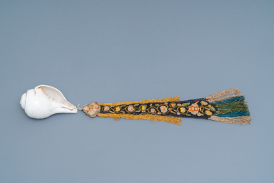 A TIbetan conch shell with embroidered silk ribbon, 19th C.