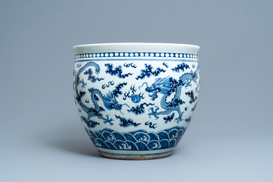 A Chinese blue and white 'dragon' fish bowl, 19th C.