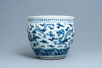 A Chinese blue and white 'dragon' fish bowl, 19th C.