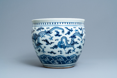 A Chinese blue and white 'dragon' fish bowl, 19th C.