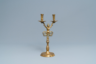 A large bronze candlestick with a siren with dolphin tails, Nuremberg, Germany, 16th C.