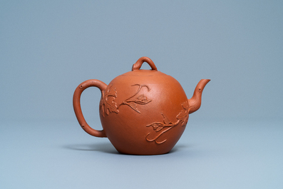 A Chinese Yixing stoneware teapot and cover, Kangxi