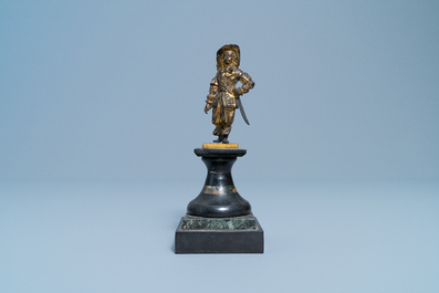 A Dutch gilt bronze model of a soldier, 17th C.