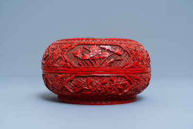 A Chinese red cinnabar lacquer box and cover, 19th C.