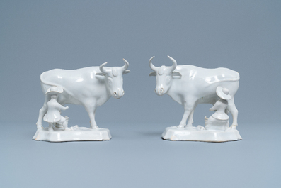 A pair of white Dutch Delftware groups of cows with milkers, 18th C.