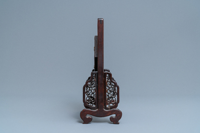 An hexagonal Chinese blue and white tile in wooden table screen, Kangxi and later