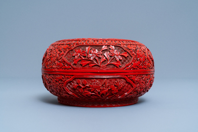 A Chinese red cinnabar lacquer box and cover, 19th C.