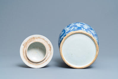 A Chinese blue and white 'butterfly' vase and cover, 19th C.