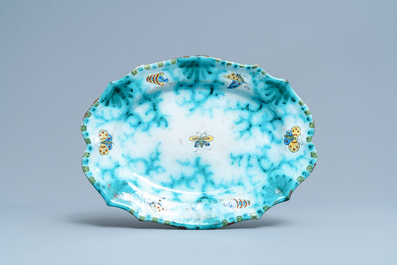 A Brussels faience tureen and cover on stand with butterflies and caterpillars, late 18th C.