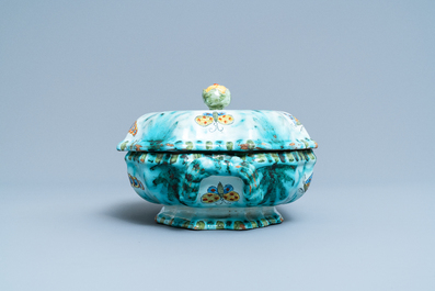 A Brussels faience tureen and cover on stand with butterflies and caterpillars, late 18th C.