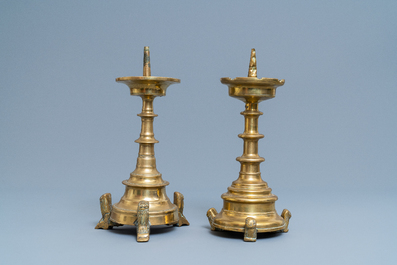 Two Flemish or Dutch bronze candlesticks, 15/16th C.
