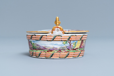 A polychrome petit feu and gilded Dutch Delft butter tub with a view on an encampment, 18th C.