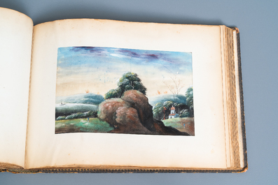 Chinese school, Canton, ink and colour on paper, 19th C.: an album with 29 landscapes and punishment scenes