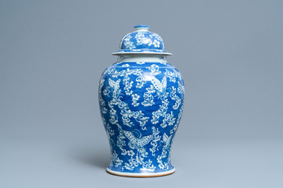 A Chinese blue and white 'butterfly' vase and cover, 19th C.