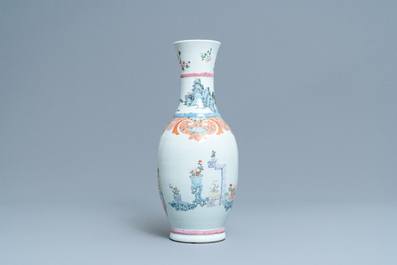 A Chinese famille rose vase with a tattoo scene from 'Jing Zhang Bao Guo', Qianlong mark, 19/20th C.