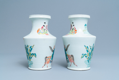 A pair of Chinese famille rose Yongzheng-style vases, 19/20th C.