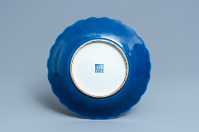 A Chinese monochrome blue lobed dish, Qianlong mark and of the period