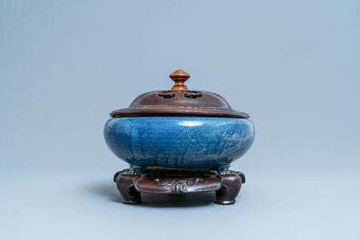 Een Chinese monochrome blauwe wierookbrander met onderglazuur floraal decor, Ming