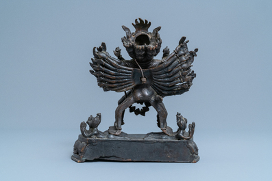 A Tibetan bronze group of Mahakala and his consort Yab-Yum, 19th C.