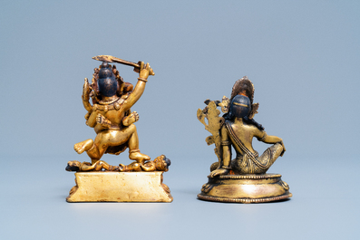 Two Sino-Tibetan gilt bronze figures, 19th C.