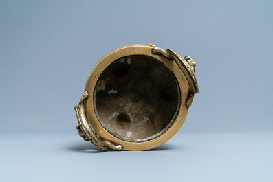 A Chinese bronze chilong-handled tripod censer, seal mark, 17/18th C.