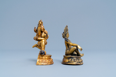 Two Sino-Tibetan gilt bronze figures, 19th C.