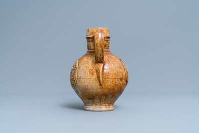 A stoneware jug with three armorial medallions, Raeren, ca. 1600
