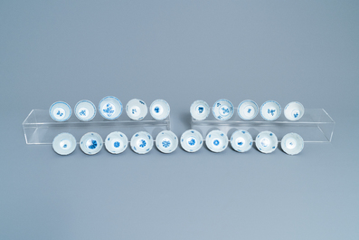 Twenty Chinese blue and white cups and twenty-four saucers, Kangxi