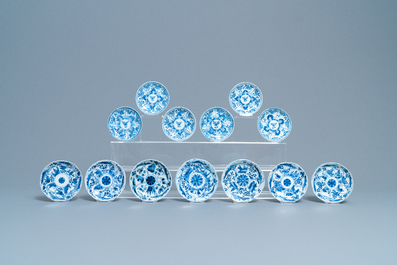 Twenty Chinese blue and white cups and twenty-four saucers, Kangxi