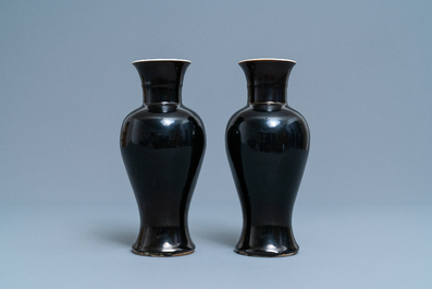 A pair of Chinese monochrome mirror black vases, 19th C.