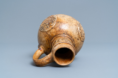 A stoneware jug with three armorial medallions, Raeren, ca. 1600