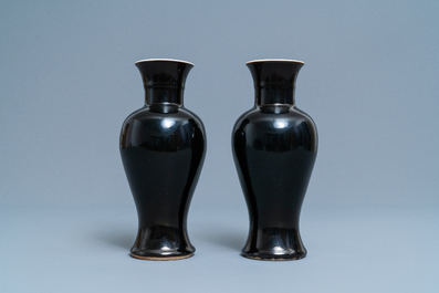 A pair of Chinese monochrome mirror black vases, 19th C.