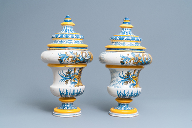 An important pair of large inscribed Italian maiolica drug jars and covers, Naples, dated 1724